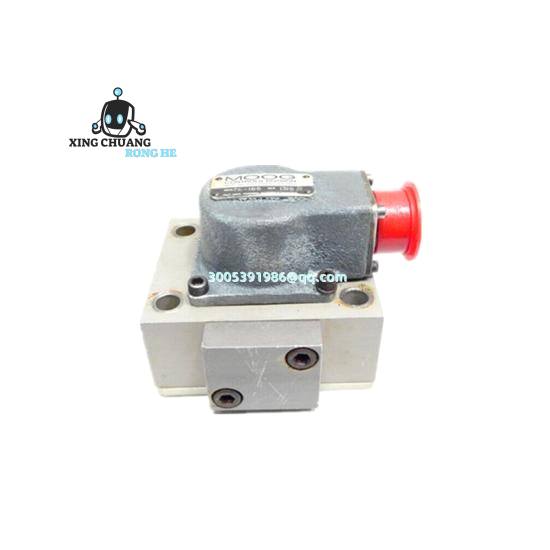 MOOG D136-001-008a module mounted on DIN rail with hydraulic lines